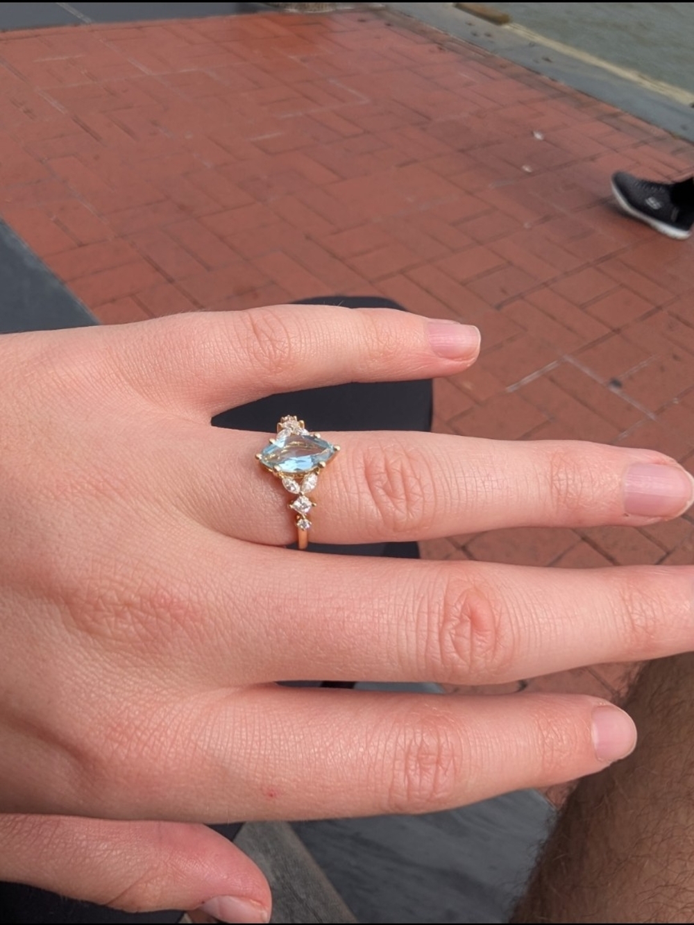 Gold Ring with Aquamarine-Cut Light Blue Gem and Accent Stones
